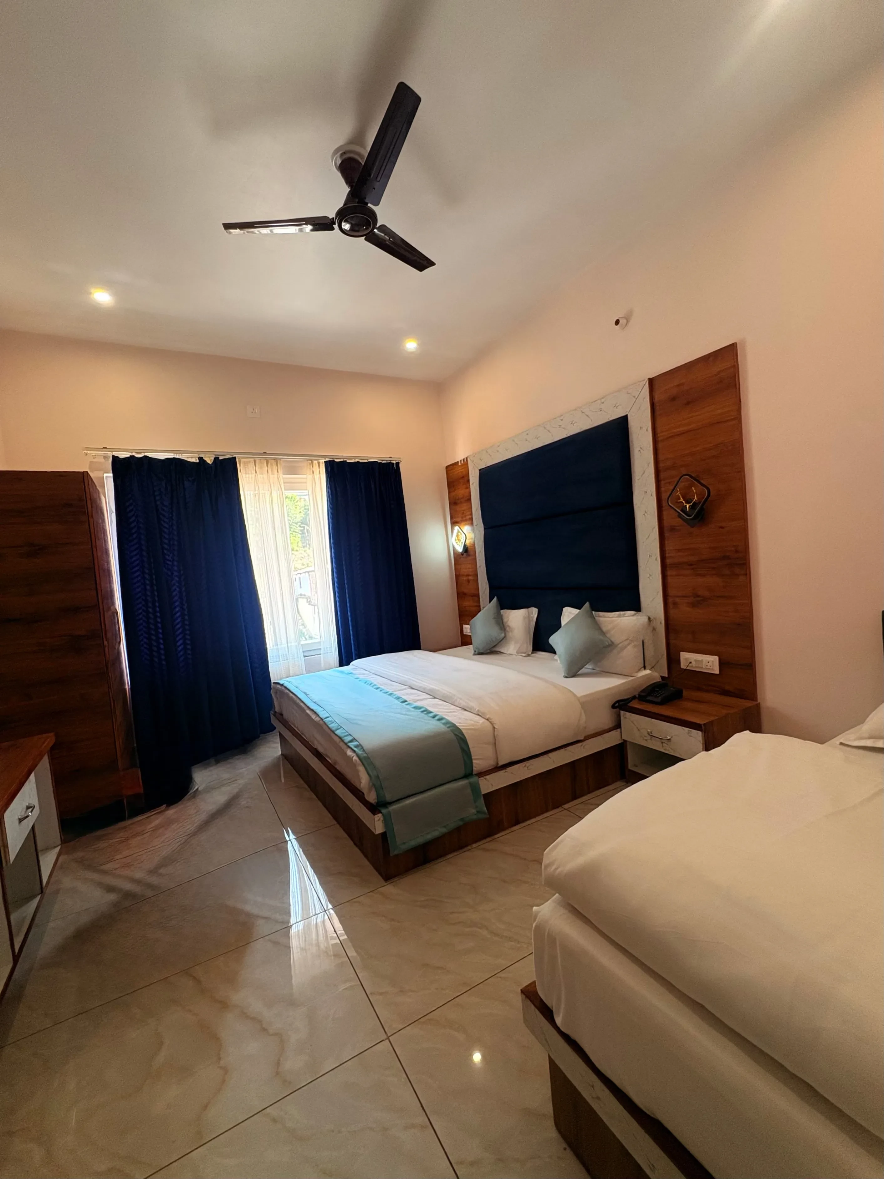 Hotel Aradhya Ganga Uttarkashi [Full View Of The Comfortable Double Bed In The Room]