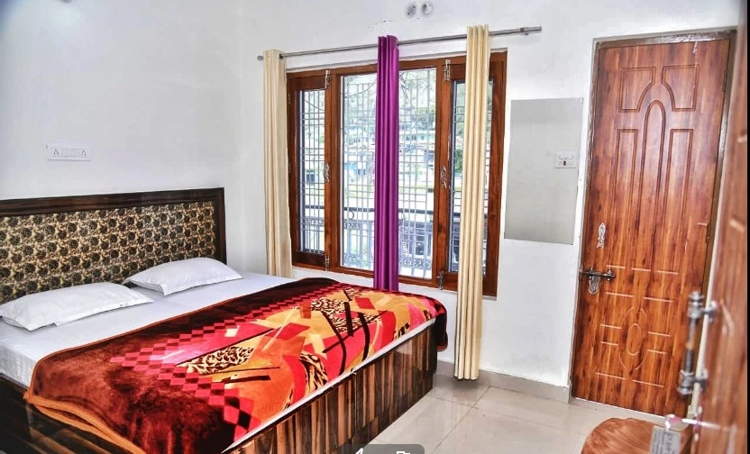 Hotel Om Shiv Shankar, Matali, Uttarkashi Uttarkashi [Full View Of The Comfortable Double Bed In The Room]